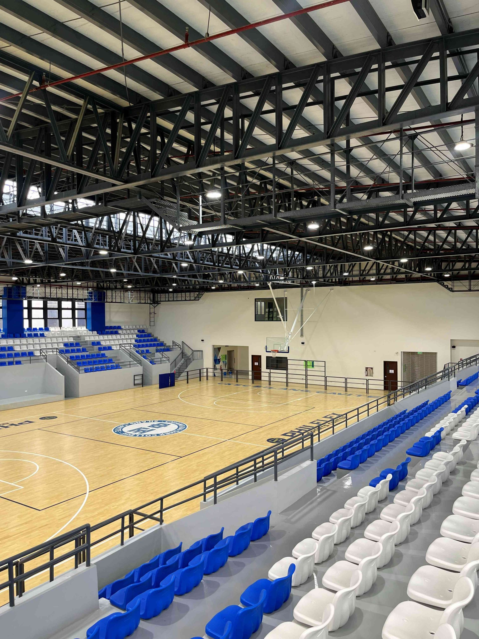 Gymnasium showing students participating in physical activities, sports, and fitness programs.