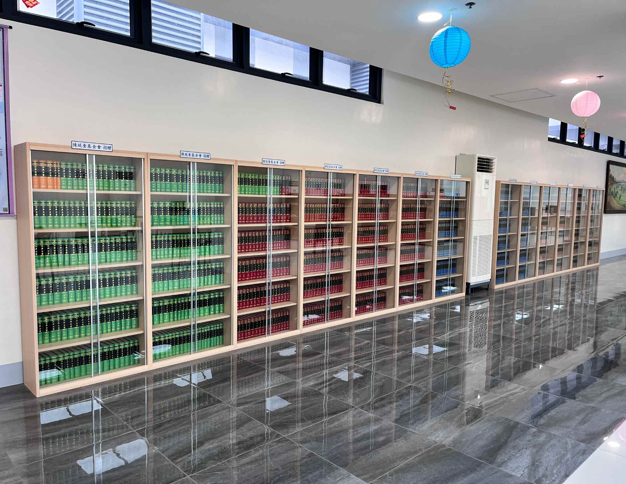 A modern Academic Resource Center with books, digital resources, and study spaces supporting student learning.