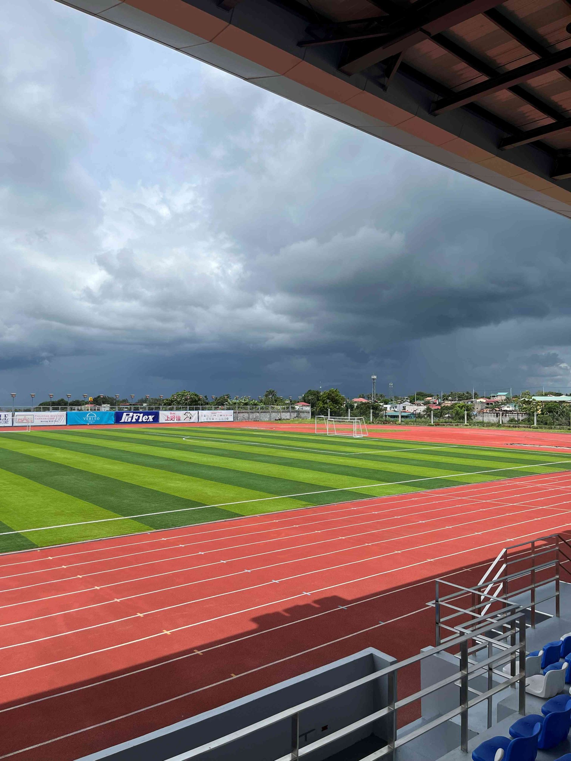 Oval track and field showing students participating in athletics, sports, and outdoor physical activities.